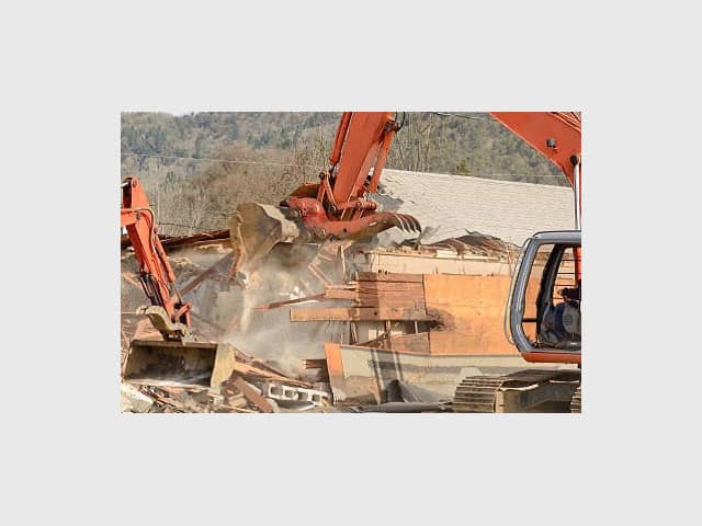 See demolition images showcasing Angry Ant Tree Services